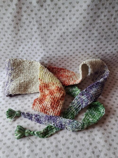 Quastenschal grün - gestrickter Schal